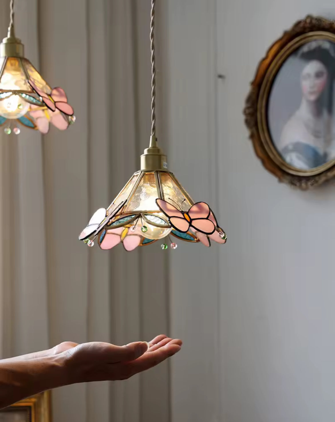 Stained glass pendant light, hand comparison